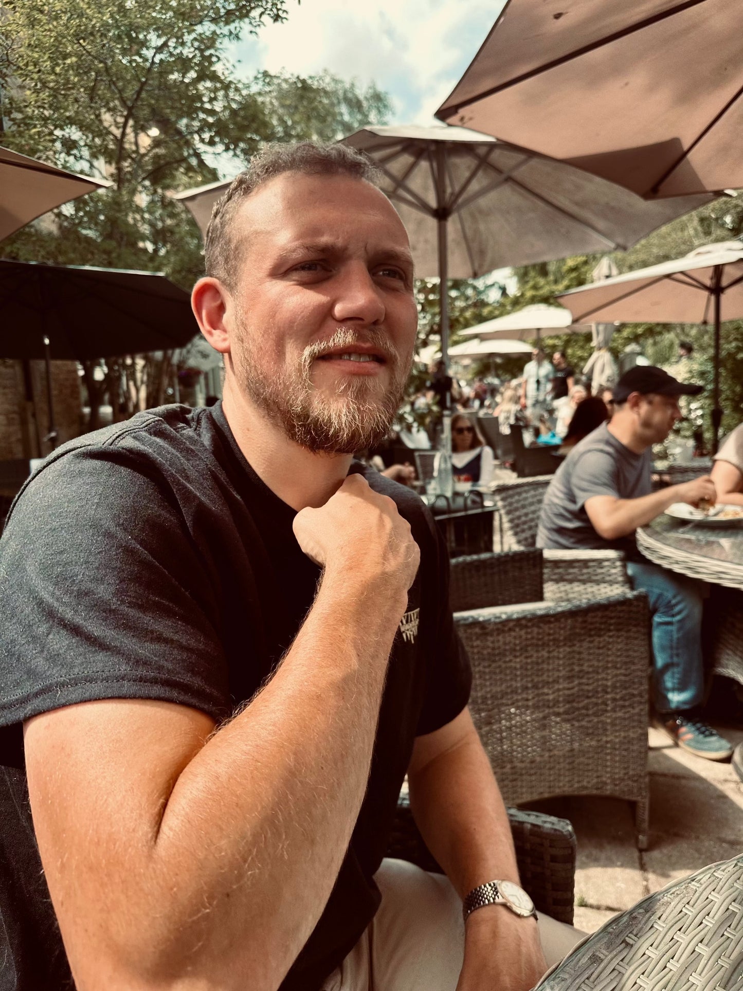 MThe WanderWest Midnight Rider Tee for a bold, versatile black shirt with embroidered logo, perfect for casual country or streetwear looks. Style and comfort.