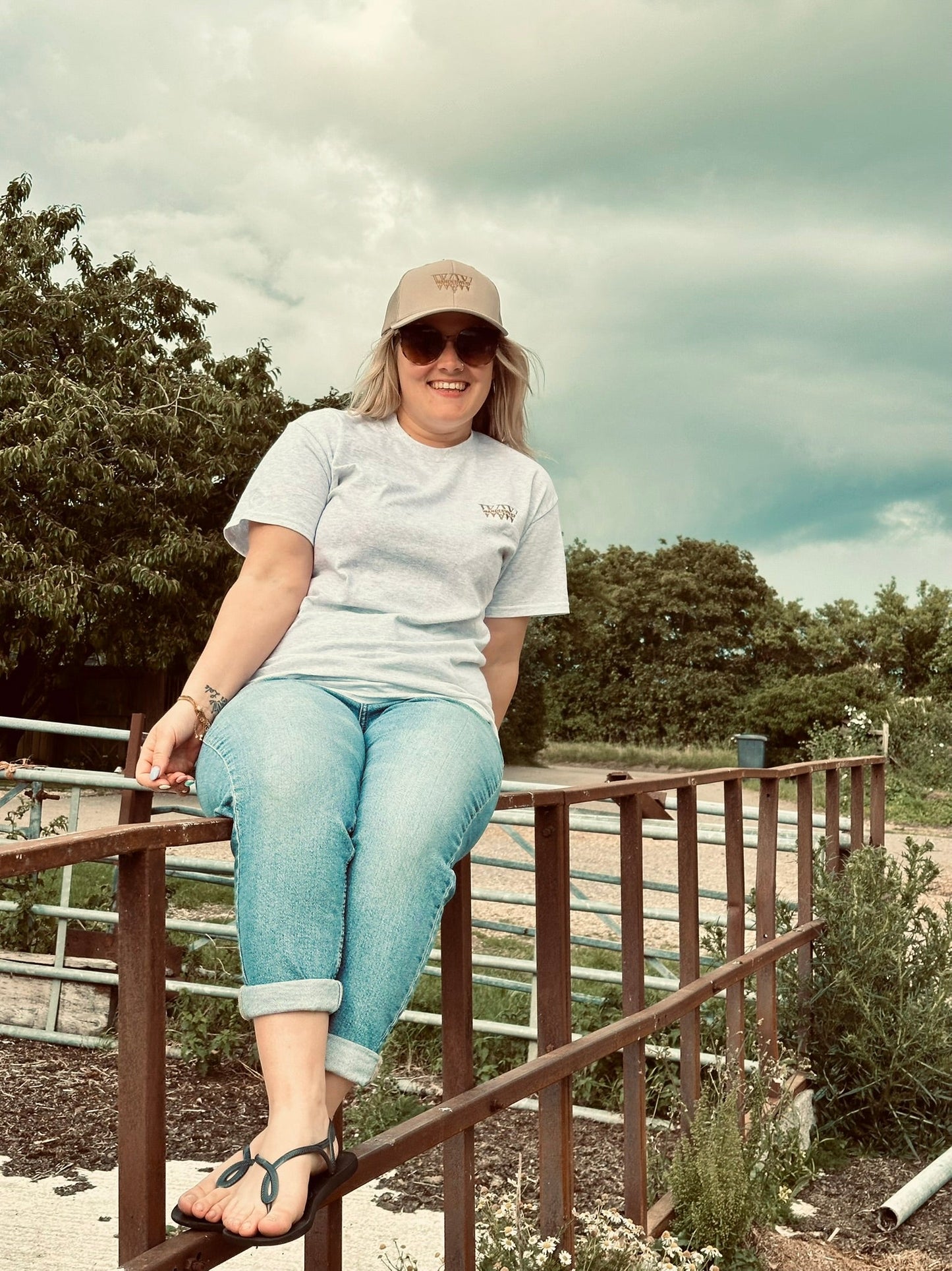 Discover the WanderWest Ashwood Tee – Ash, crafted for comfort with soft cotton and a structured look, perfect for conscious shoppers. Made just for you on demand. Shop the WanderWest Saddleback Trucker – Khaki, a durable cap with mesh back for sunny days, road trips, and outdoor adventures. Perfect for rugged yet casual style.