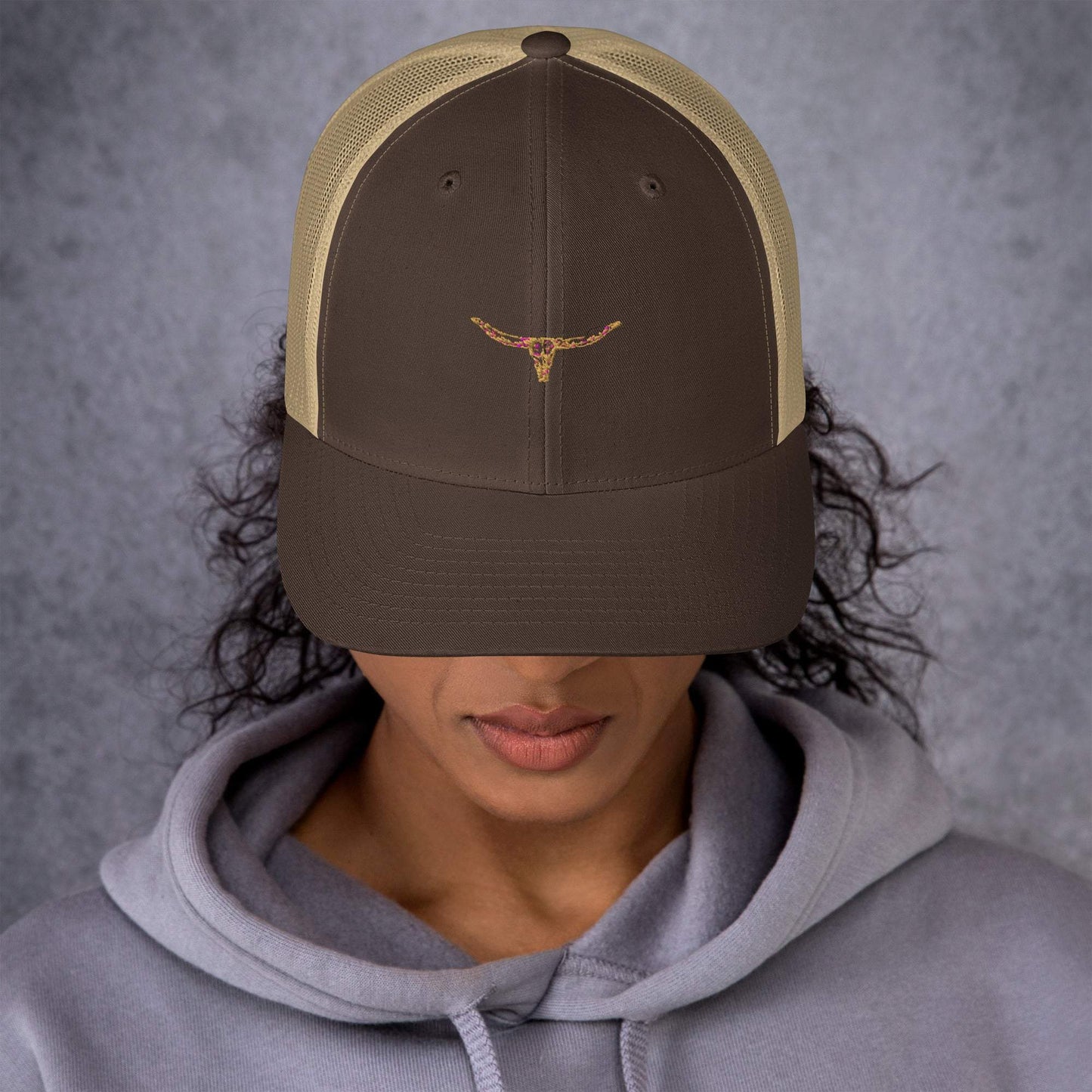 Brown Longhorn Bull Skull trucker cap with mesh back and structured design.