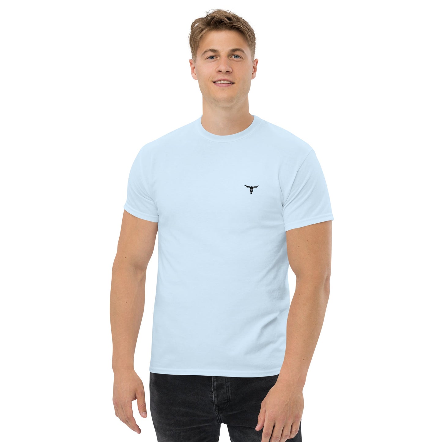 Unisex classic cotton tee with small bull skull logo on light blue fabric, styled for structured streetwear look