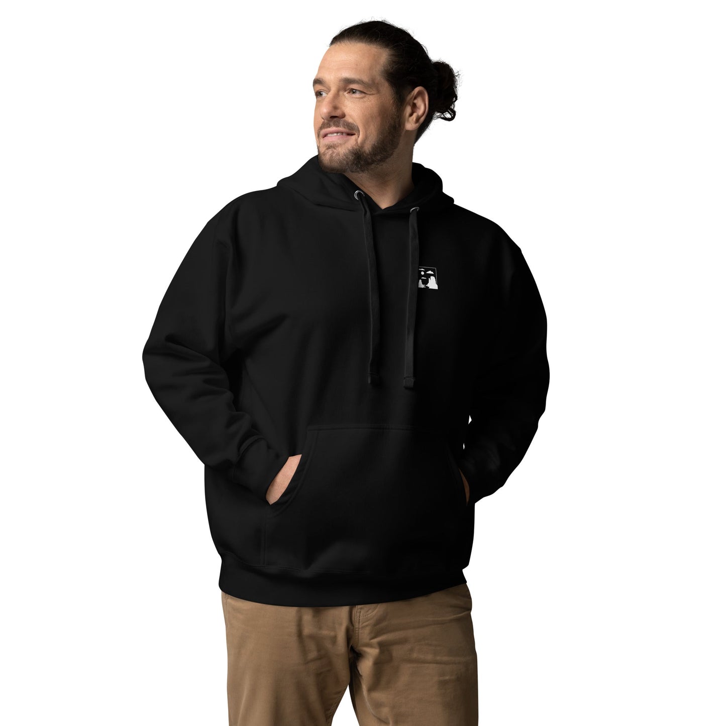 Black Monument Valley unisex hoodie with front pouch pocket and matching drawstrings, worn by a man.