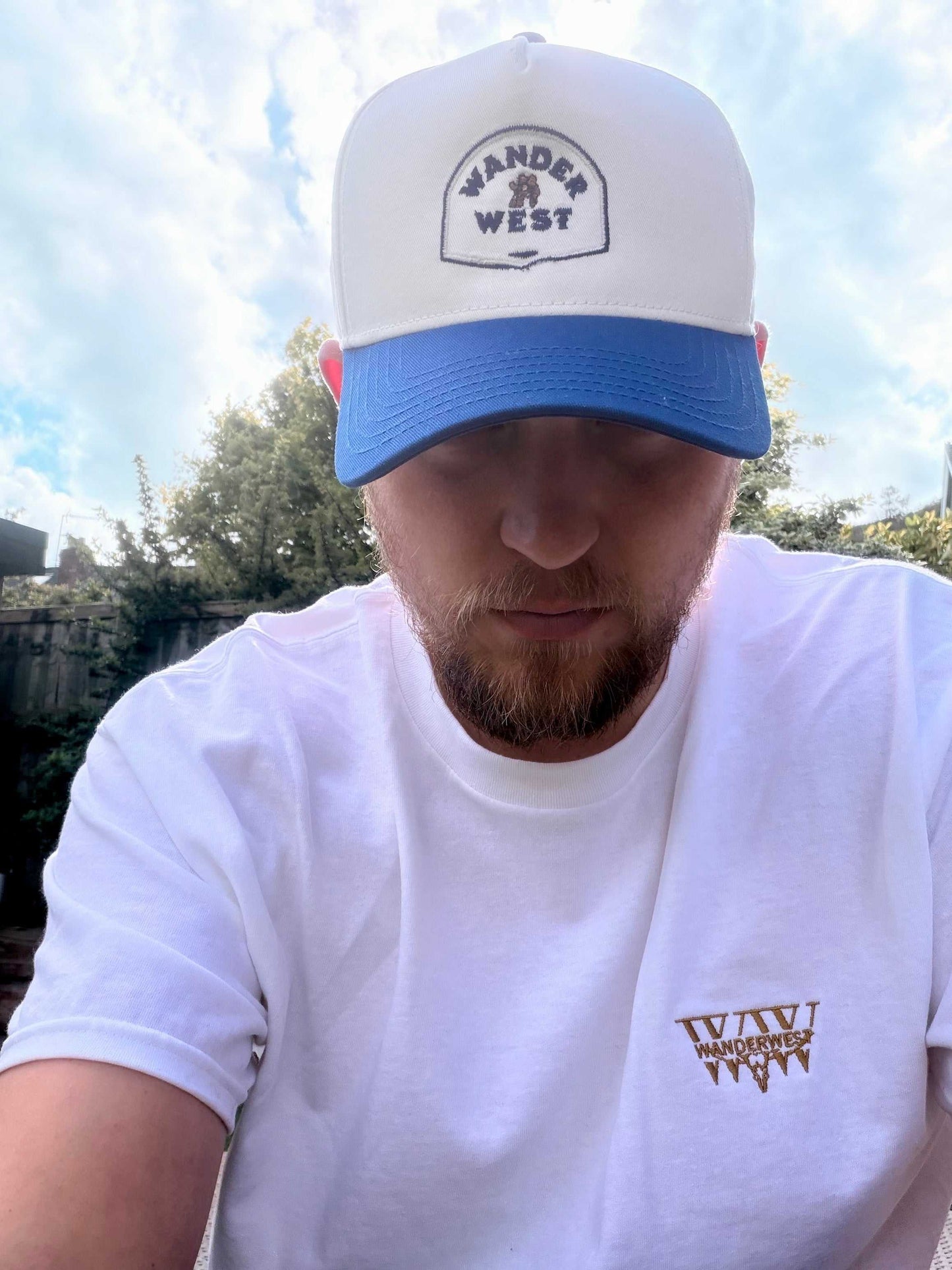 Natural and liberty western dad cap styled with relaxed countryside-inspired streetwear outfit