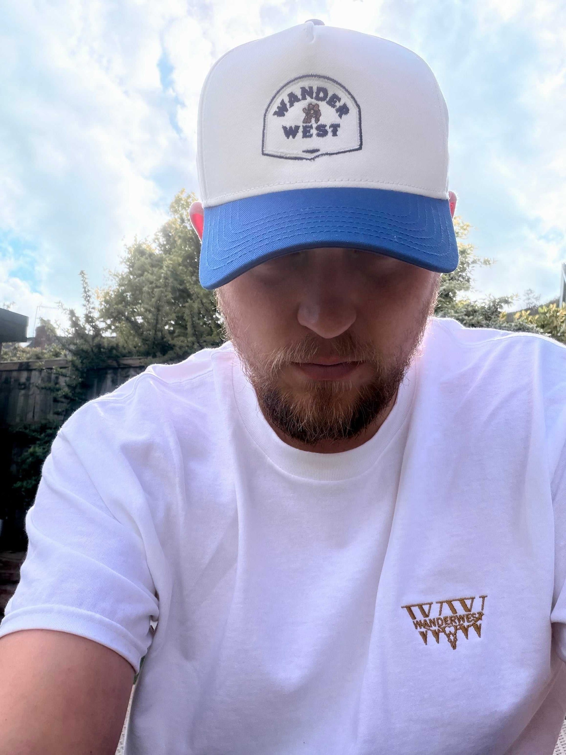 Natural and liberty western dad cap styled with relaxed countryside-inspired streetwear outfit