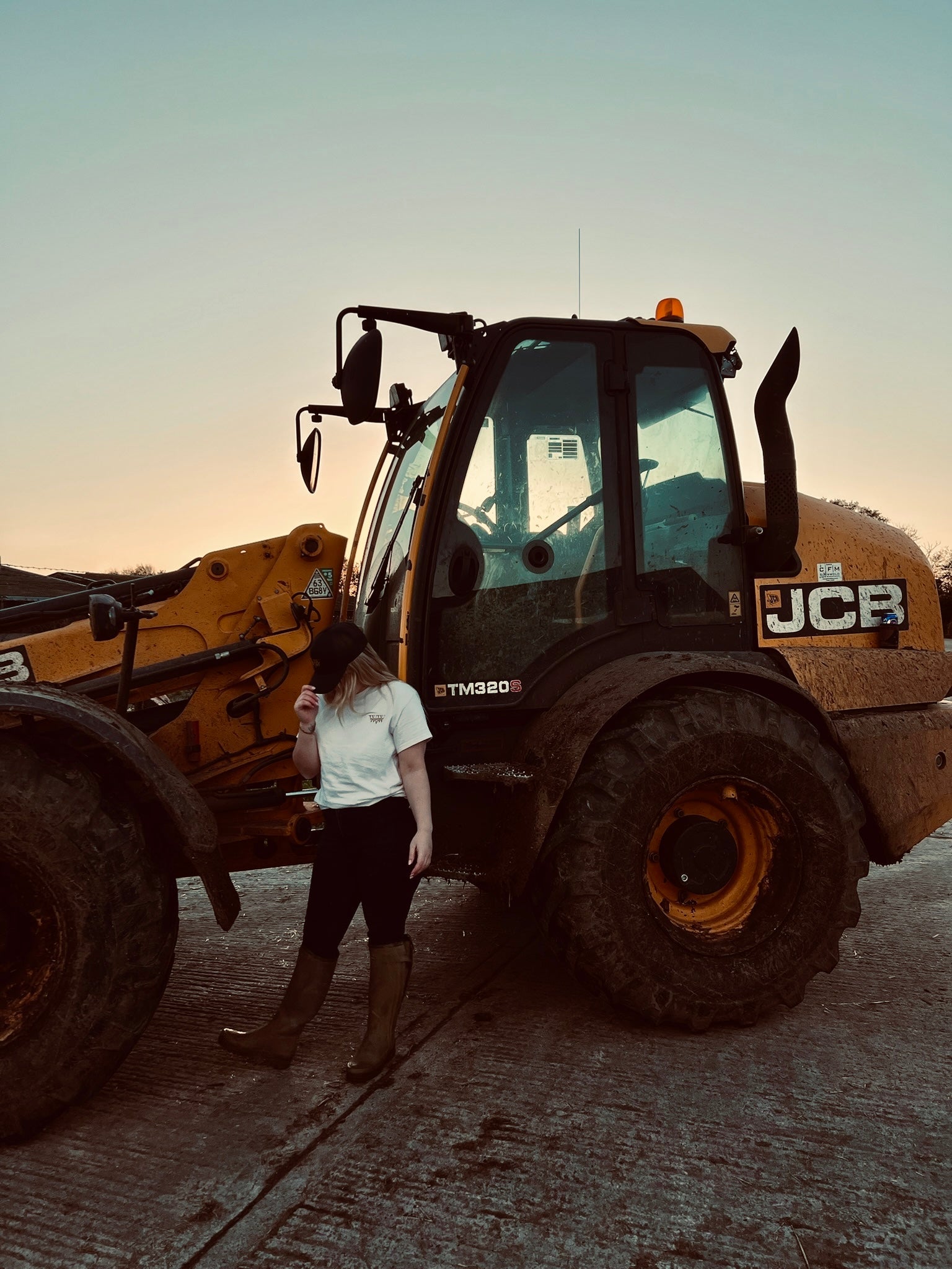 The WanderWest Homestead Tee – Natural, crafted from 100% cotton, perfect for relaxed country looks with embroidered logo. Conscious, stylish, and comfortable wear.