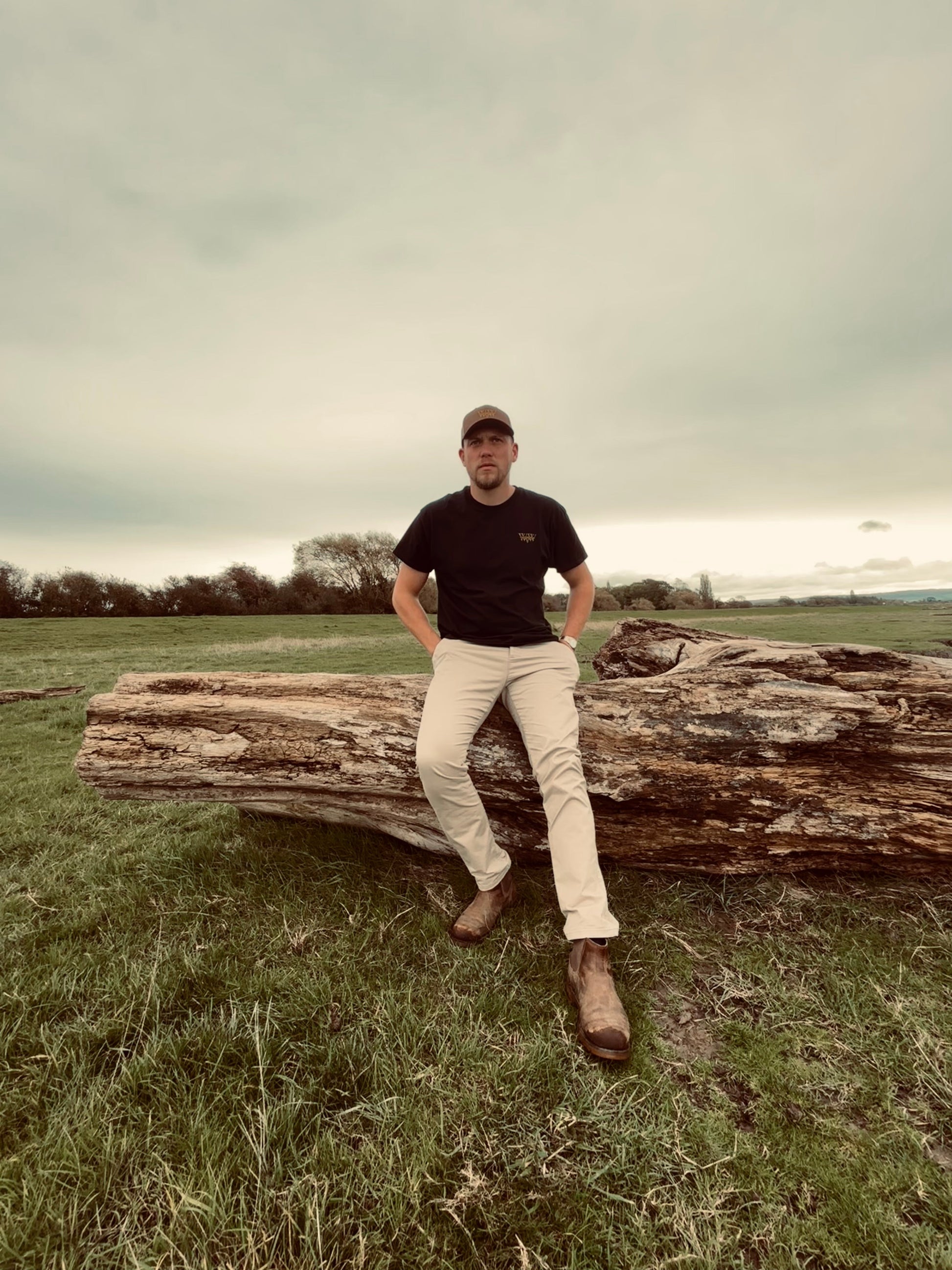 The WanderWest Midnight Rider Tee for a bold, versatile black shirt with embroidered logo, perfect for casual country or streetwear looks. Style and comfort.