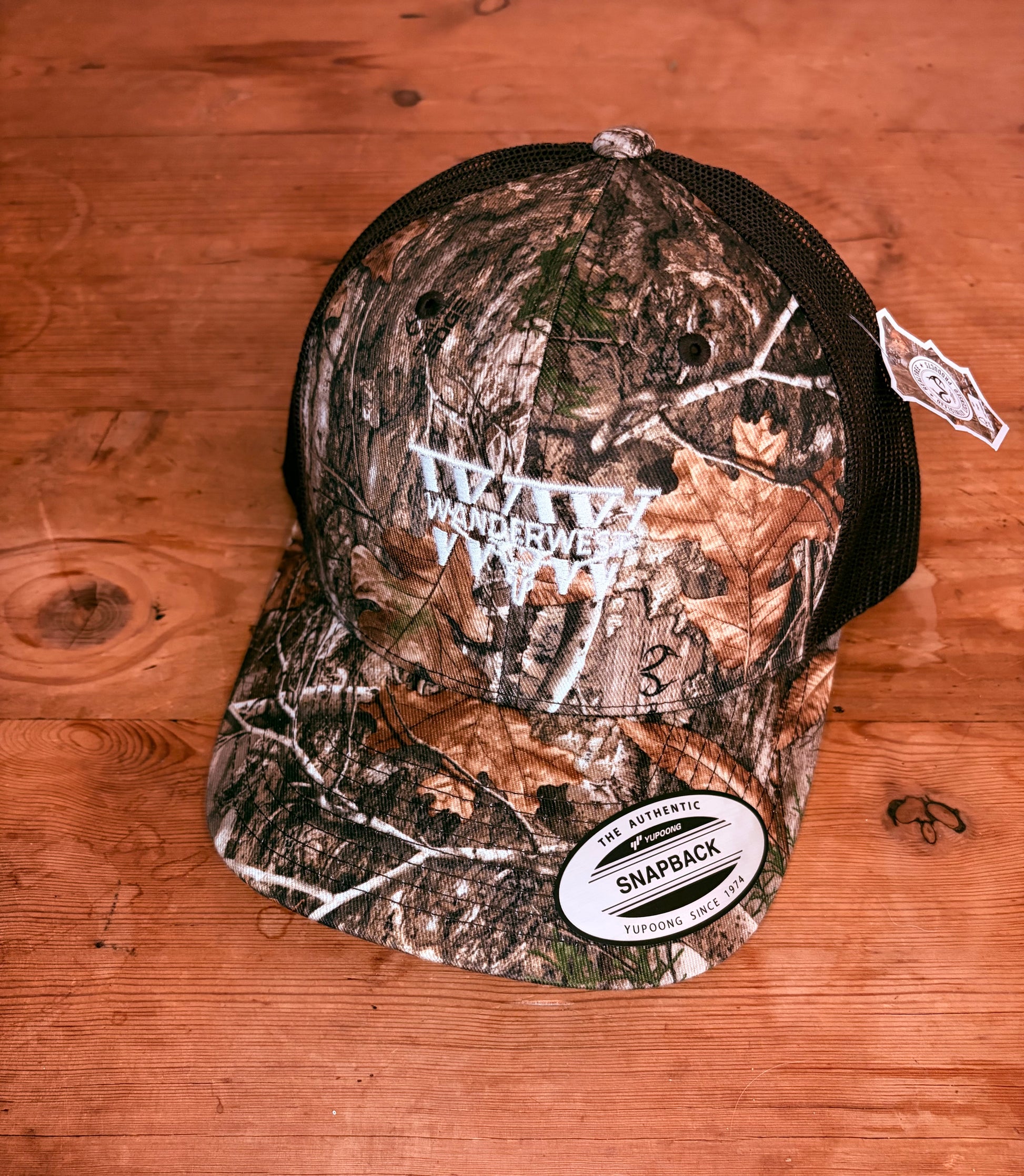 Northwoods Mark Camo is clean, sharp, and built for everyday wear. Designed for people who appreciate gear that works hard without trying too hard, the Northwoods Mark Camo combines classic woodland camo styling with a crisp white WanderWest mark that stands out in all the right ways. It’s bold enough to make a statement, while still staying versatile enough to wear with just about anything in your wardrobe.

The classic woodland camo pattern gives the hat a timeless outdoor-inspired look that feels right a