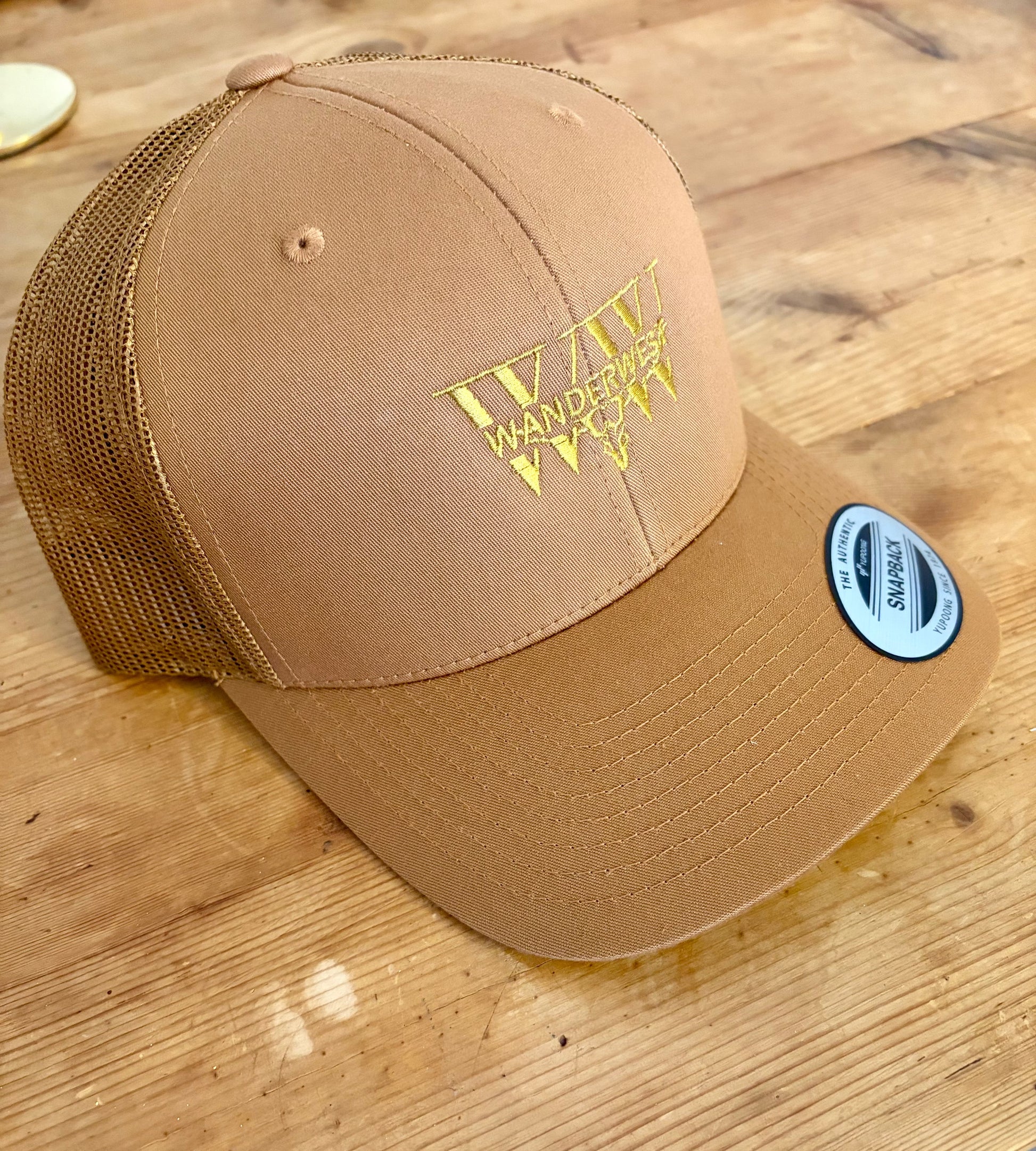 Copper Canyon Trucker – Caramel WanderWest Logo Cap