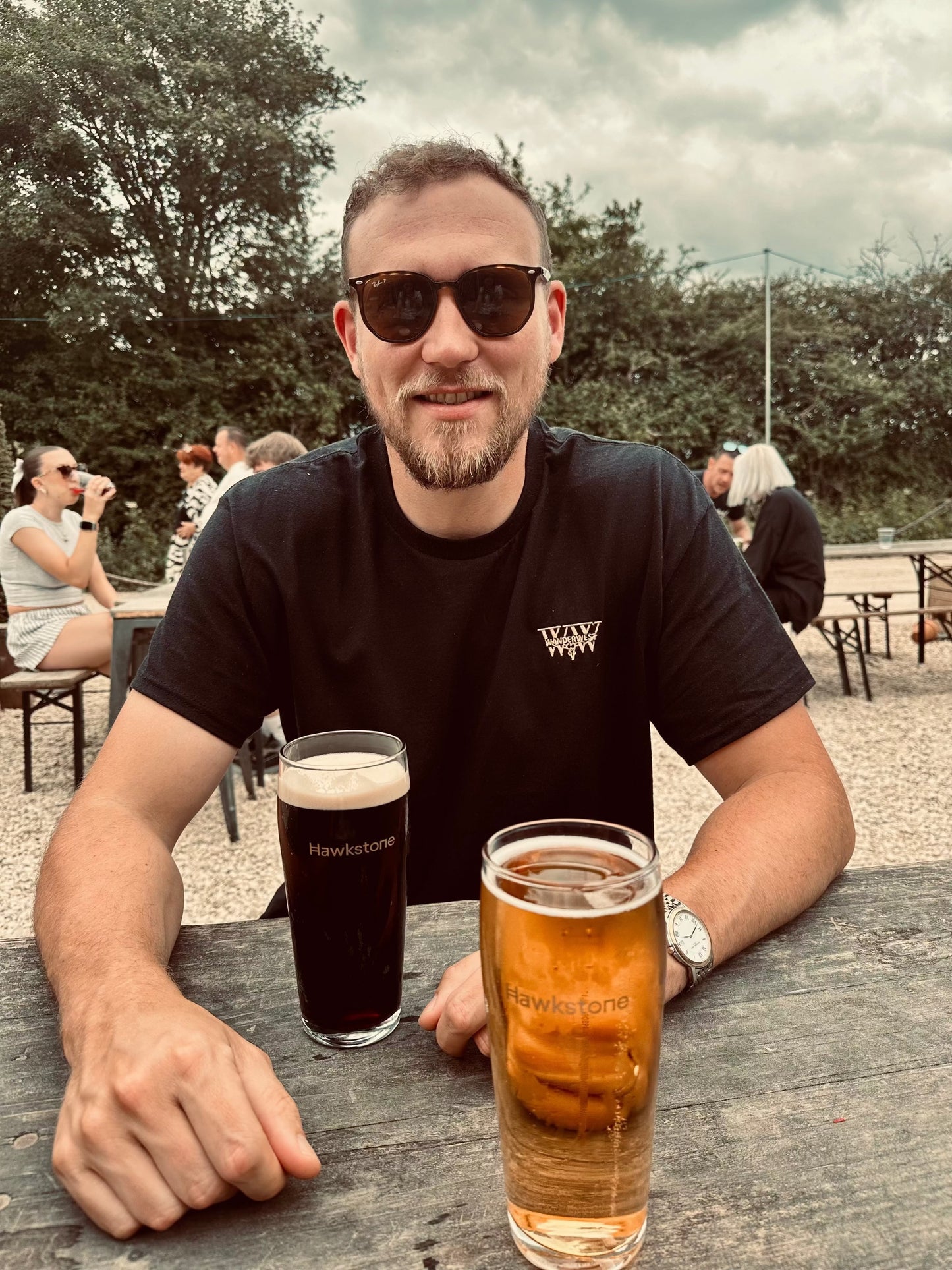 The WanderWest Midnight Rider Tee for a bold, versatile black shirt with embroidered logo, perfect for casual country or streetwear looks. Style and comfort.