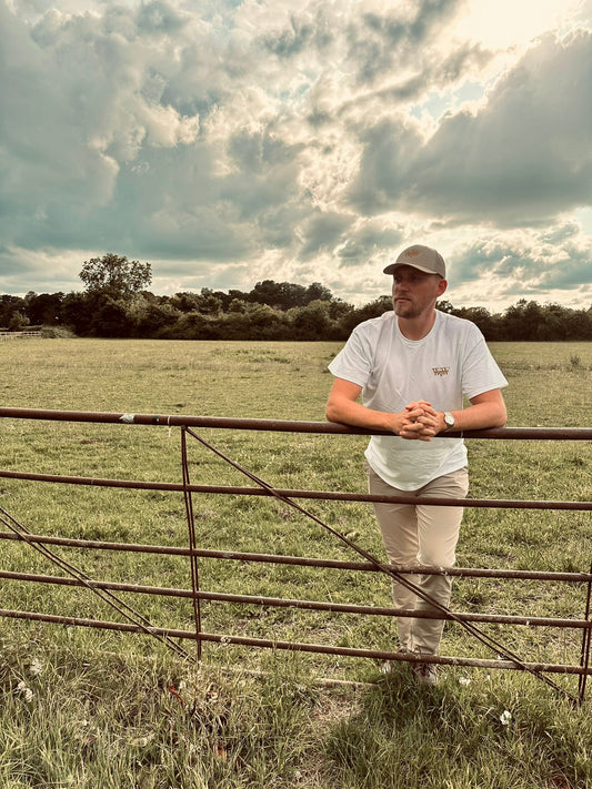 Shop the WanderWest Saddleback Trucker – Khaki, a durable cap with mesh back for sunny days, road trips, and outdoor adventures. Perfect for rugged yet casual style.