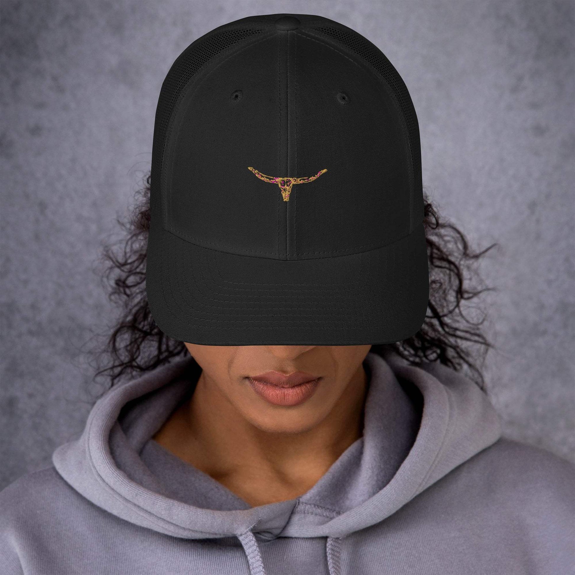 Longhorn Bull Skull Trucker Cap with mesh back and embroidered design.