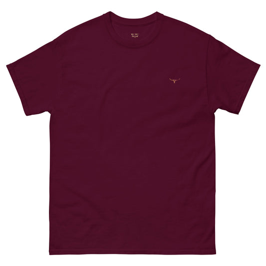 Our Longhorn Bull Skull Frontier Tee in maroon, featuring embroidered logo on 100% cotton fabric. Perfect for country and road-trip inspired outfits. Fast shipping!p