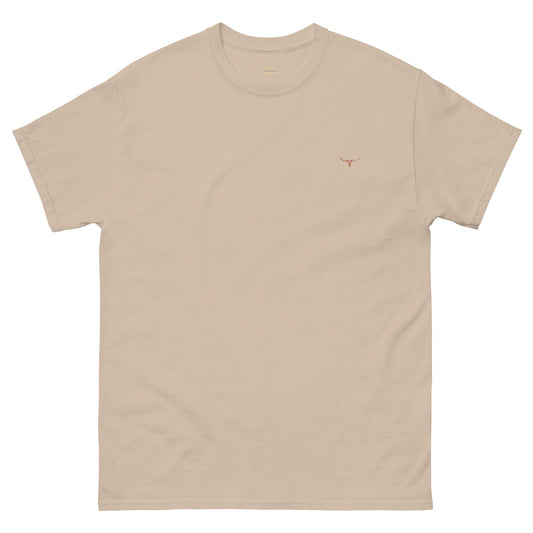 Front view of the WanderWest Longhorn Bull Skull Desert Drift T-shirt in Sand — country-style tee featuring an embroidered bull skull design and branded logo, displayed on a plain background.
