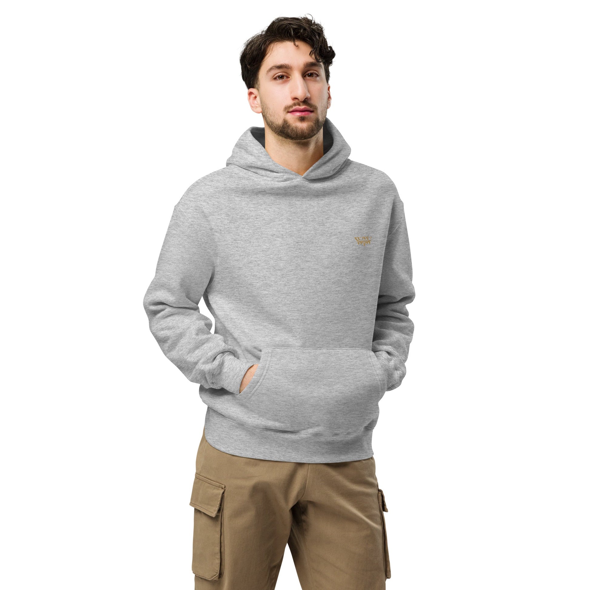Man wearing grey WanderWest logo embroidered oversized hoodie with kangaroo pocket and brown