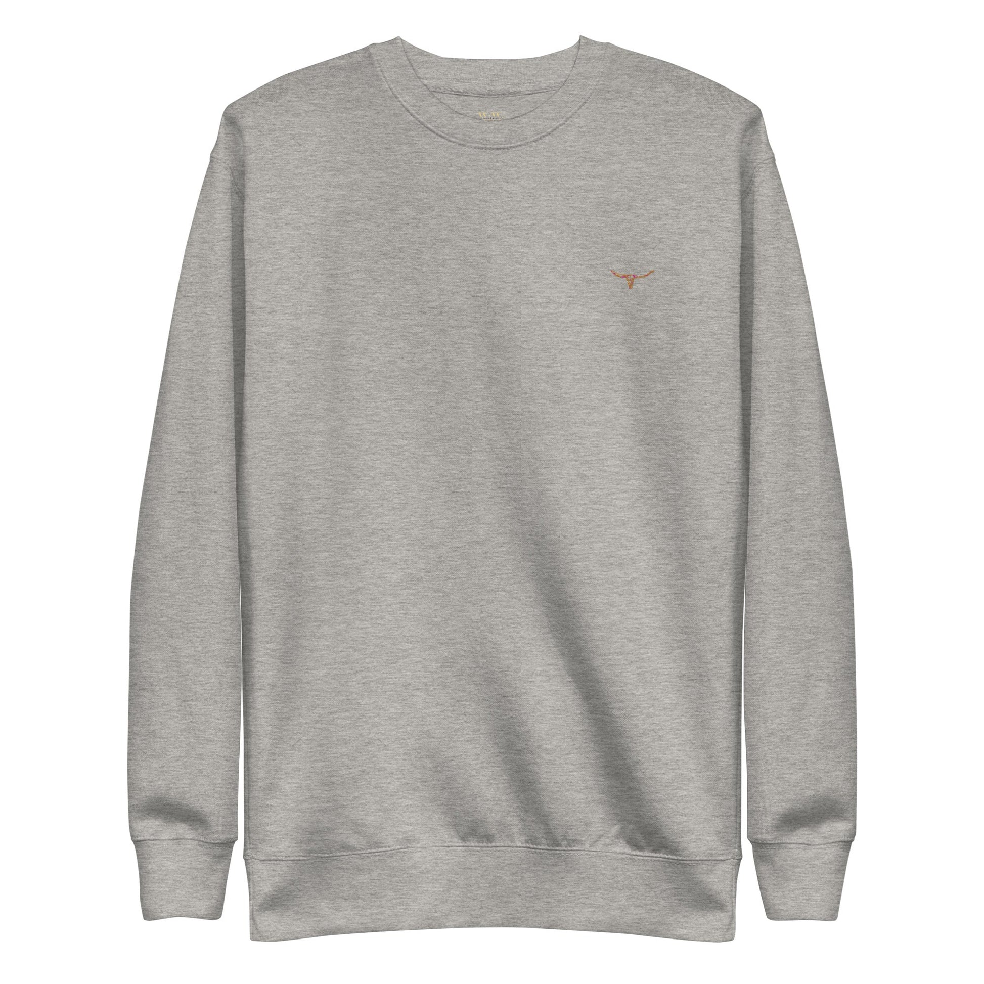 Unisex charcoal sweatshirt with long horn skull embroidered on chest, ribbed crew neck, cuffs, and hem, made from soft cotton blend fleece